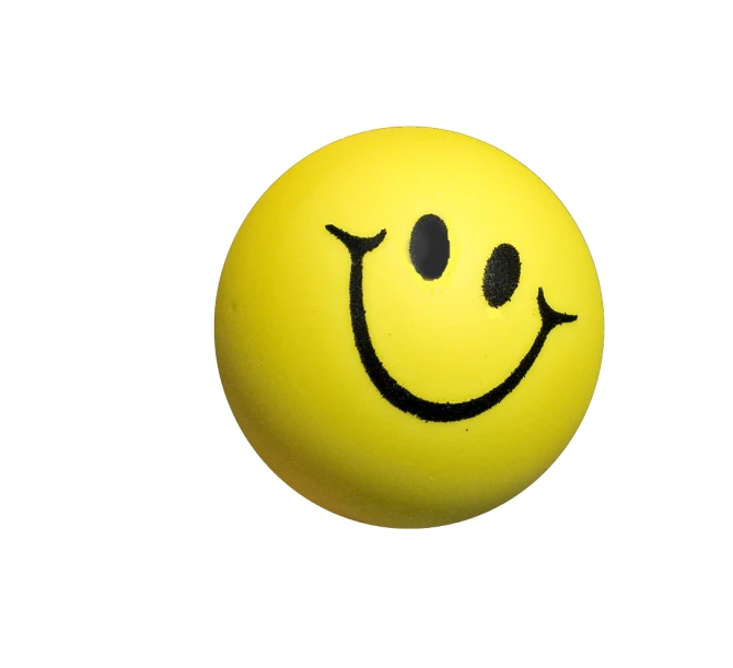 a yellow smiley face ball with a missing tooth