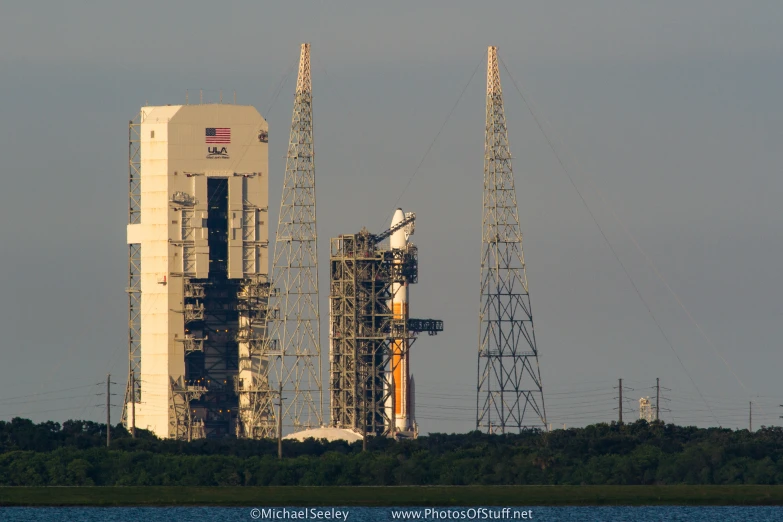 the space shuttle sits on top of a stack