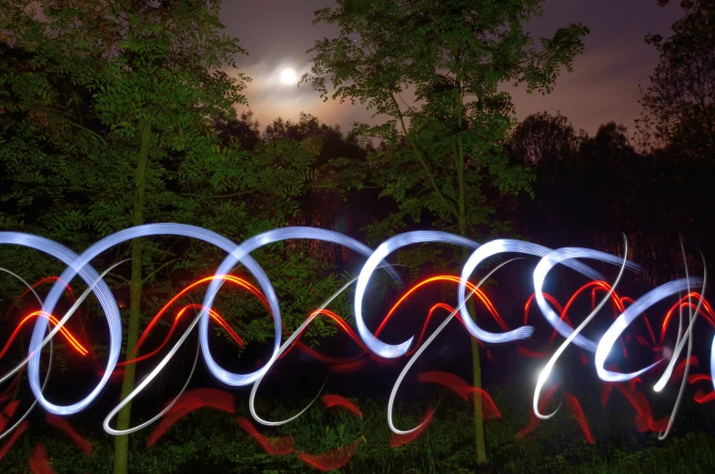 a pograph of a long exposure of lights from different angles