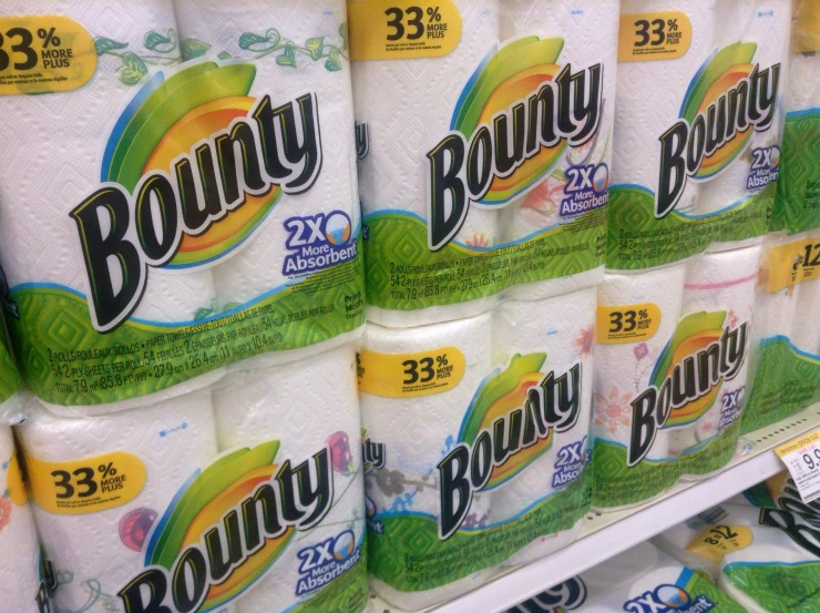 many rolls of toilet paper on a store shelf