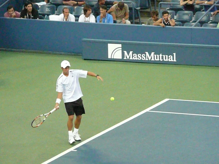 a tennis player is on the court playing a game