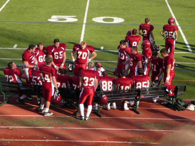 a group of football players standing next to each other