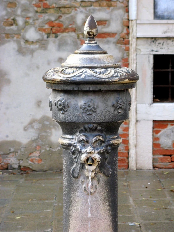 a statue is being held outside near a building