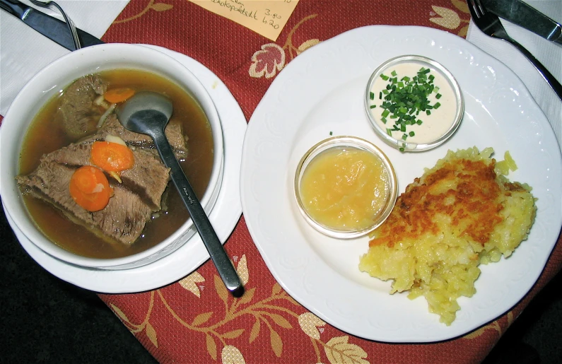 two plates that have different types of food on them