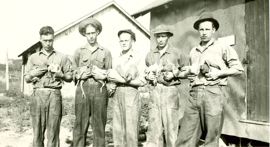 the men are posing for a picture together