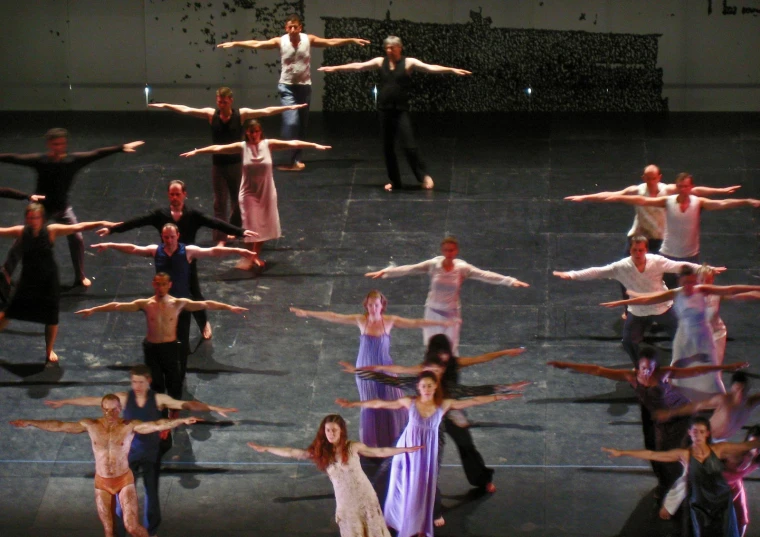 a dance performance in front of a group of people