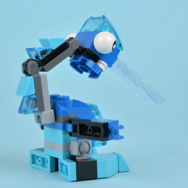 there is a small lego robot that looks like he has just been set off