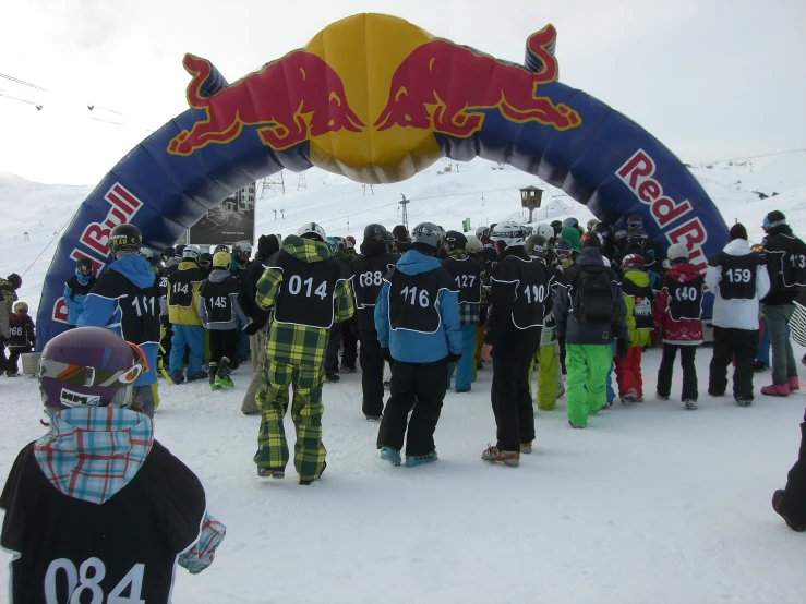 many people are getting ready to ski on the snow