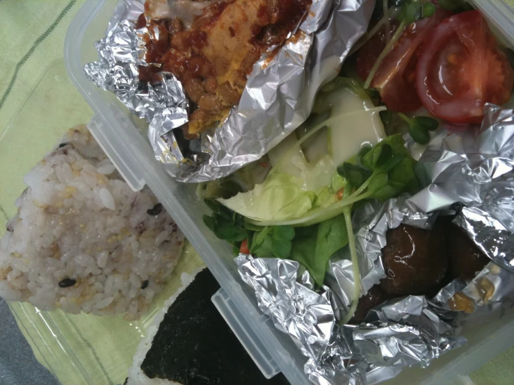 food in a clear plastic container on a table