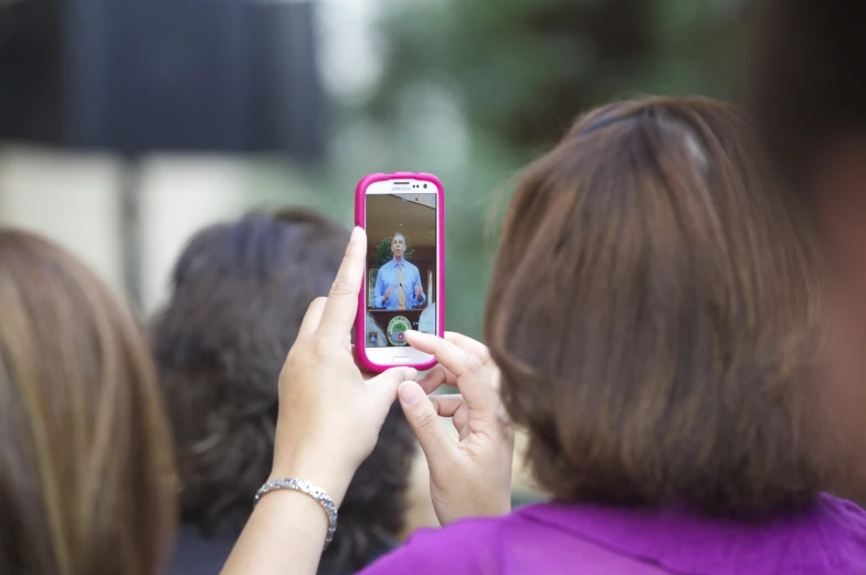 a person is taking a picture with their cell phone