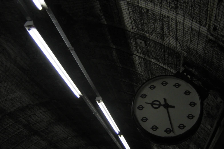 an image of a clock that is glowing in the dark