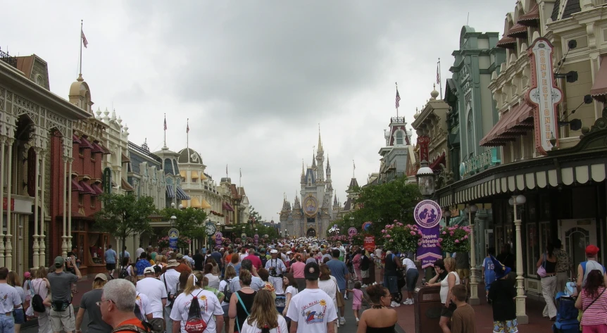 large crowd of people walking through a european street