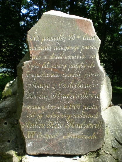 the inscription on the large rock is very decorative