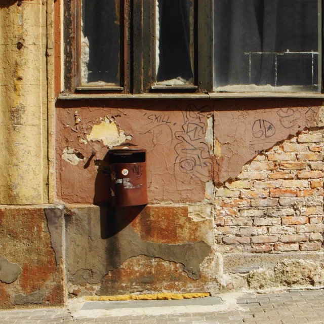 a building with graffiti that looks old