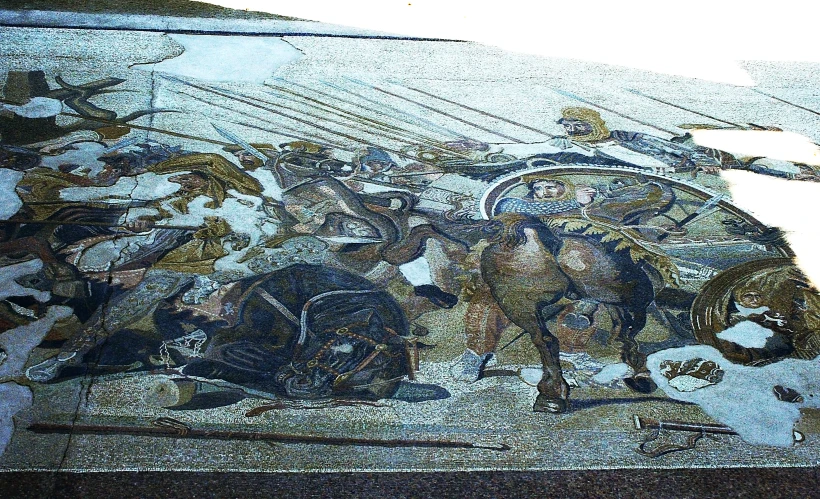 a mosaic in a courtyard with different scenes