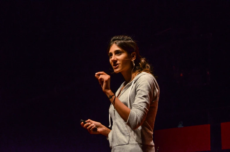 an image of a woman giving a talk