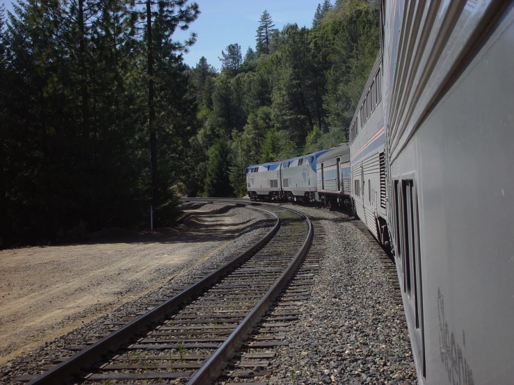 train tracks are shown side by side and on top of each other