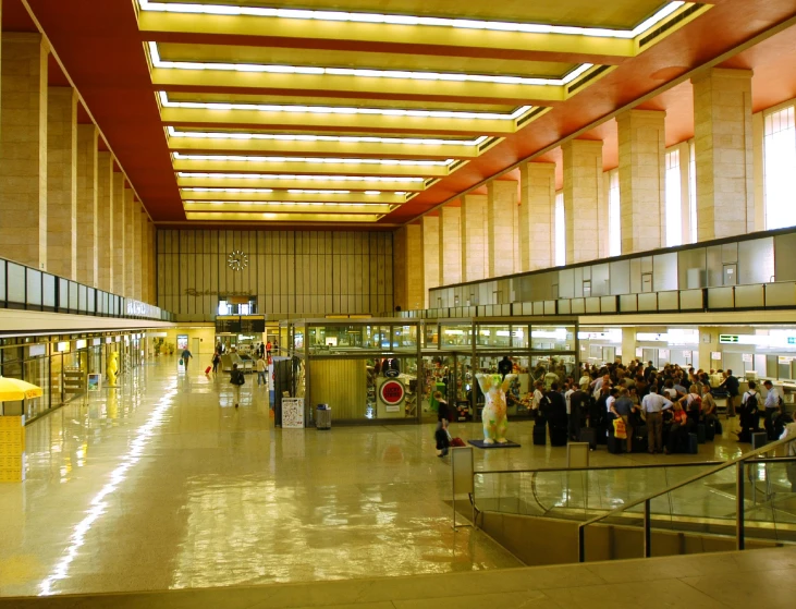 people are standing around a large building