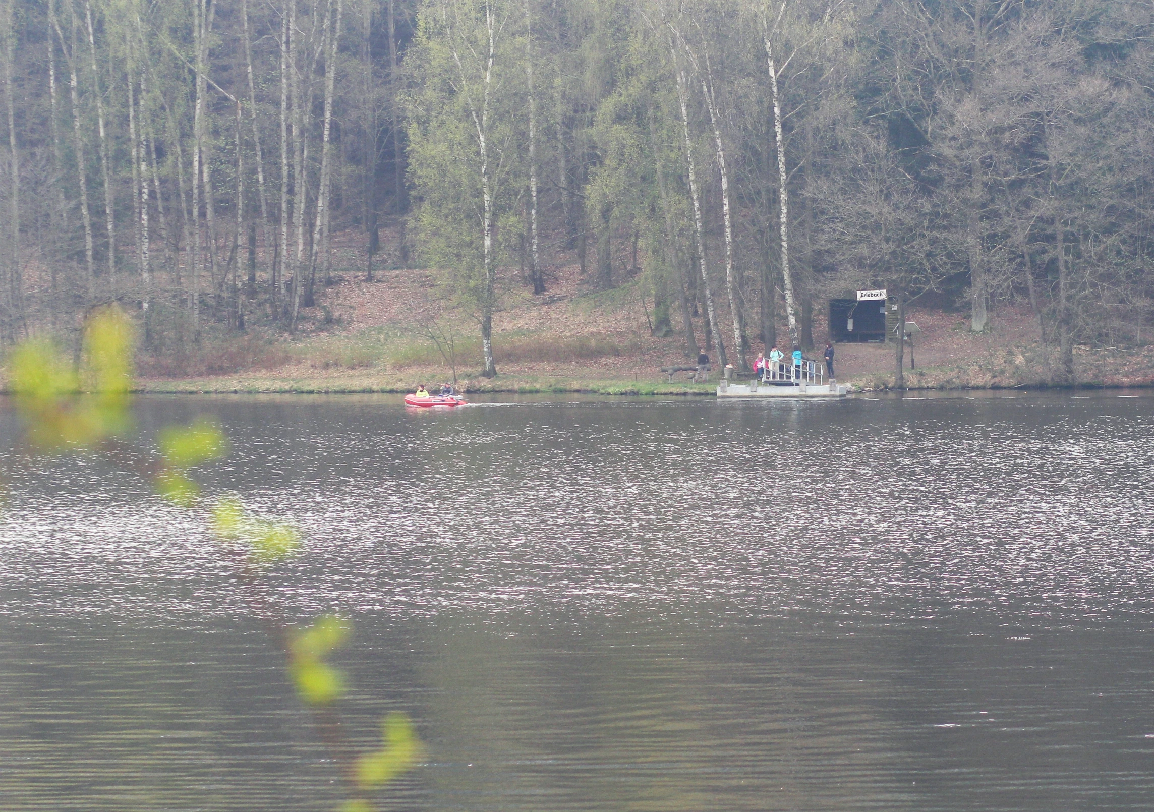 a couple of boats that are floating on the water