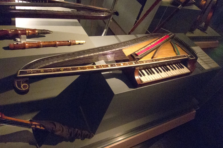 there is a piano on display in a museum