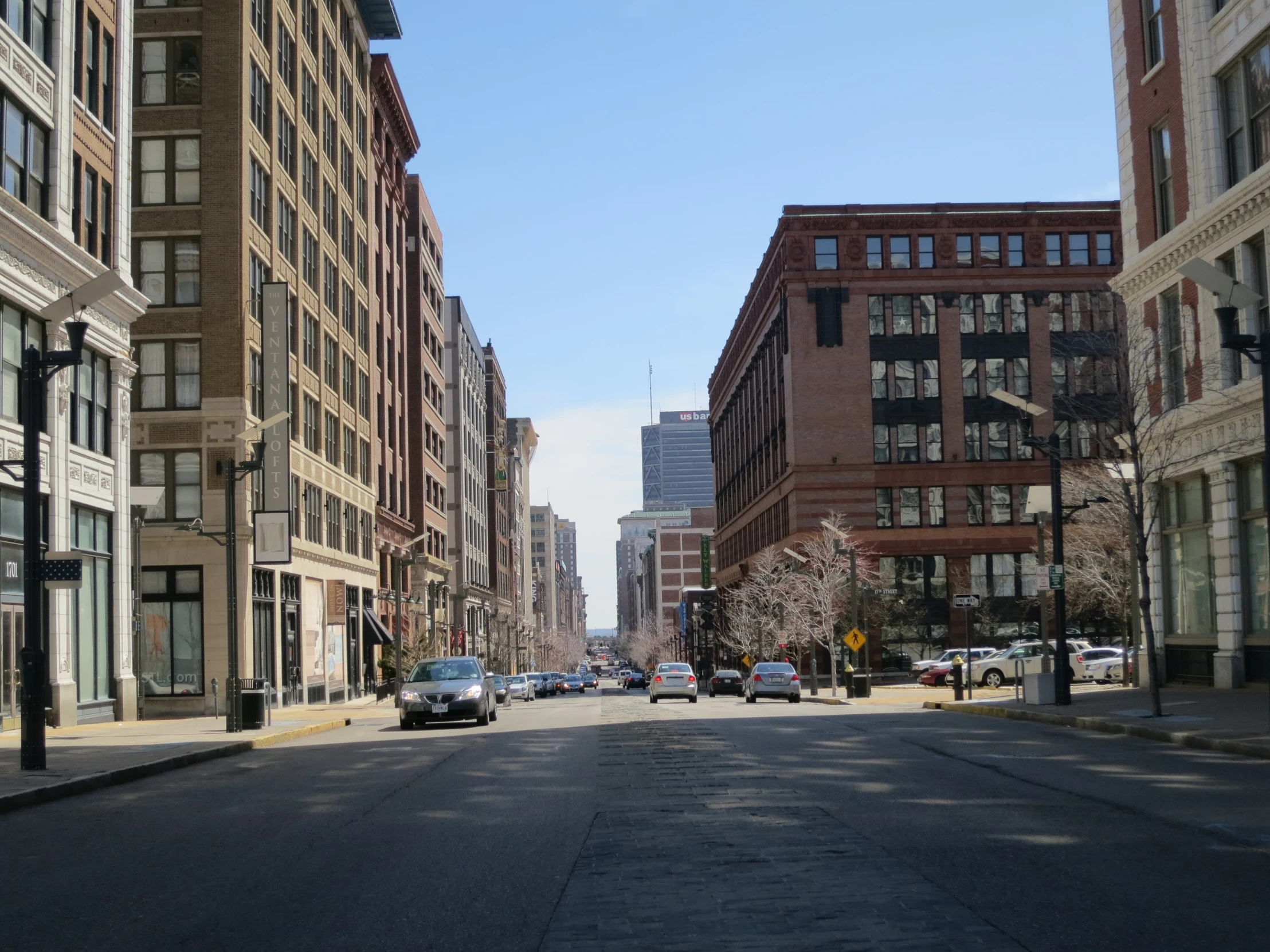 a view from the street where cars drive on the road