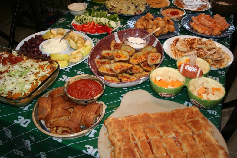 many plates of food on a table