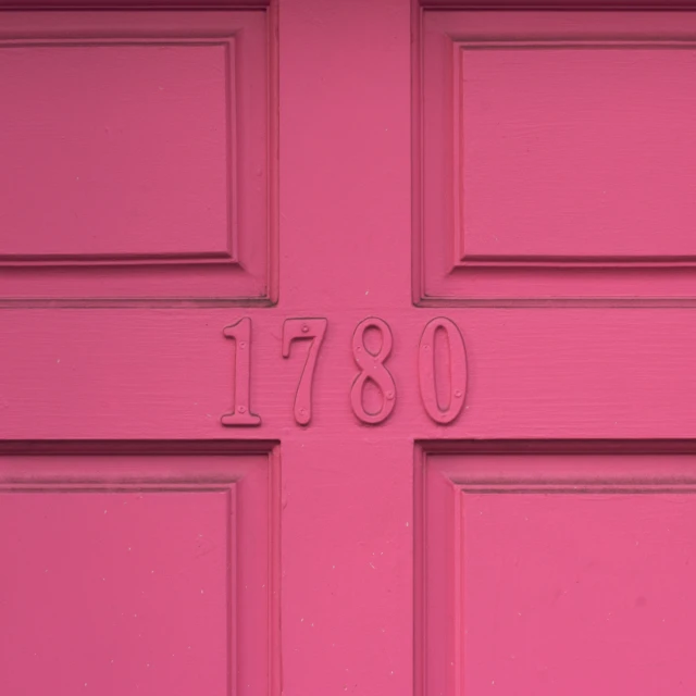 a pink door that has the number 760 written on it