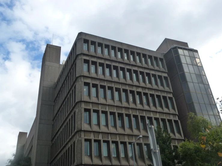 an office building in a city with large windows