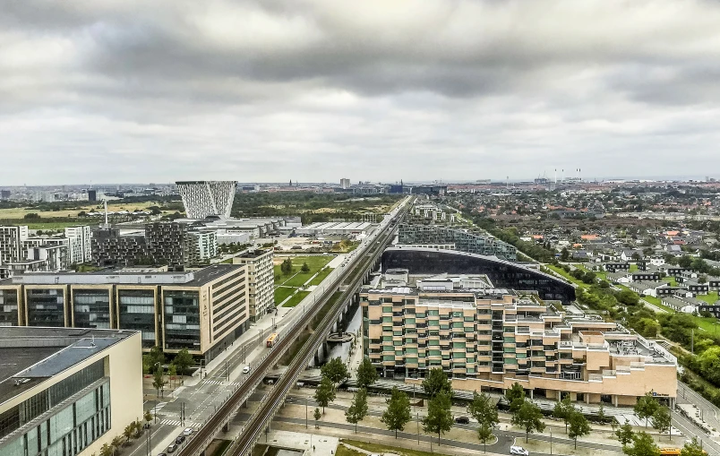 a city is in the foreground with buildings all around it