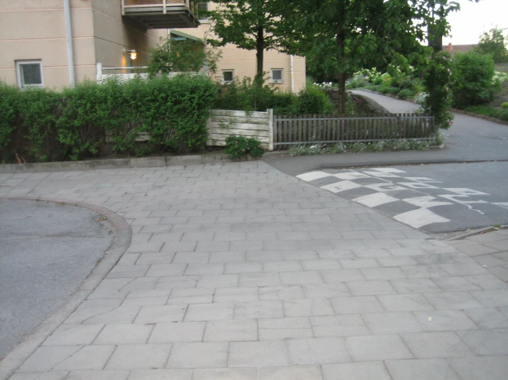 a wall is shown with some plants growing