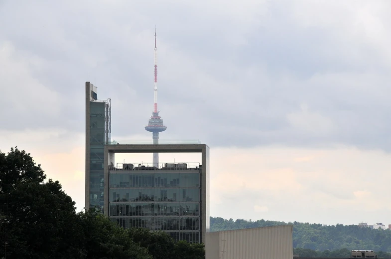 the view of an observation tower from across the city