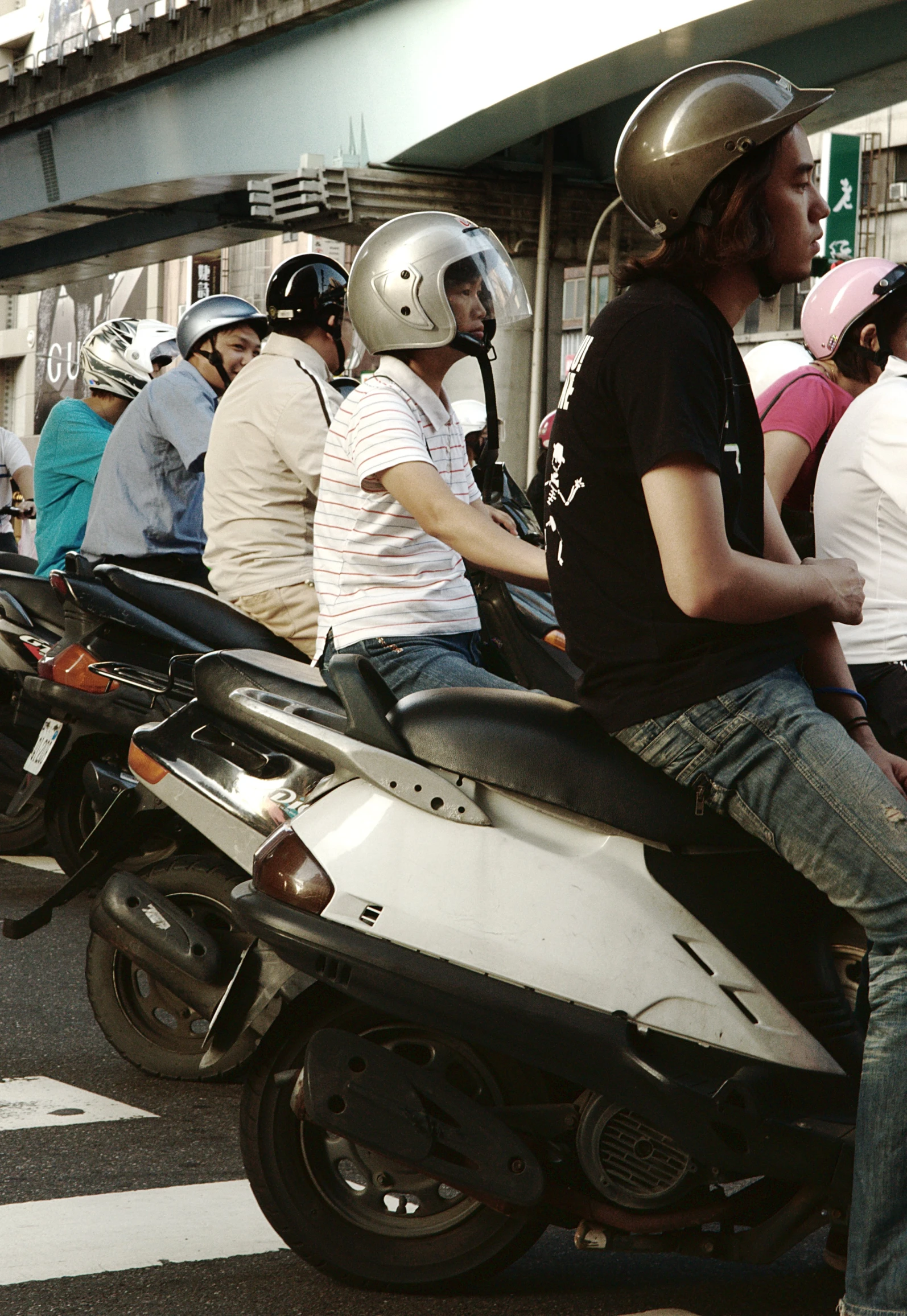 a man is riding a motorcycle on the street