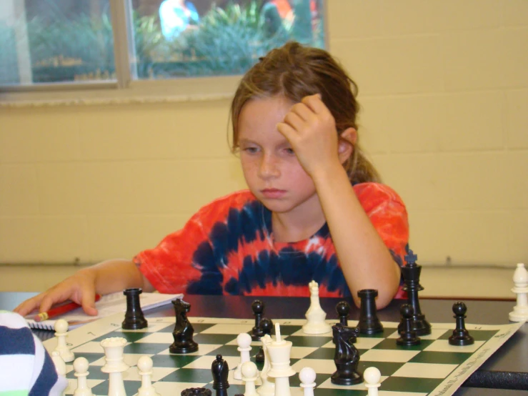a  playing a game of chess