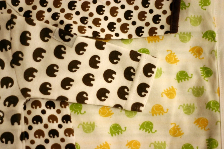 various cloths with elephant print on them
