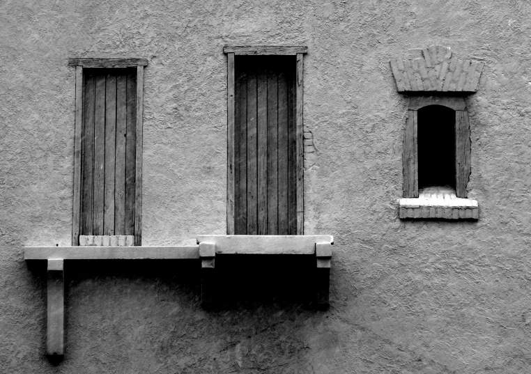 black and white pograph of a couple windows