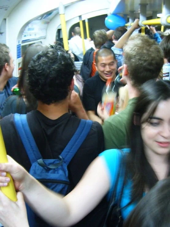 a group of people on a public transit bus