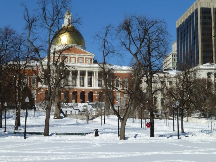 an image of a large building that is in the snow