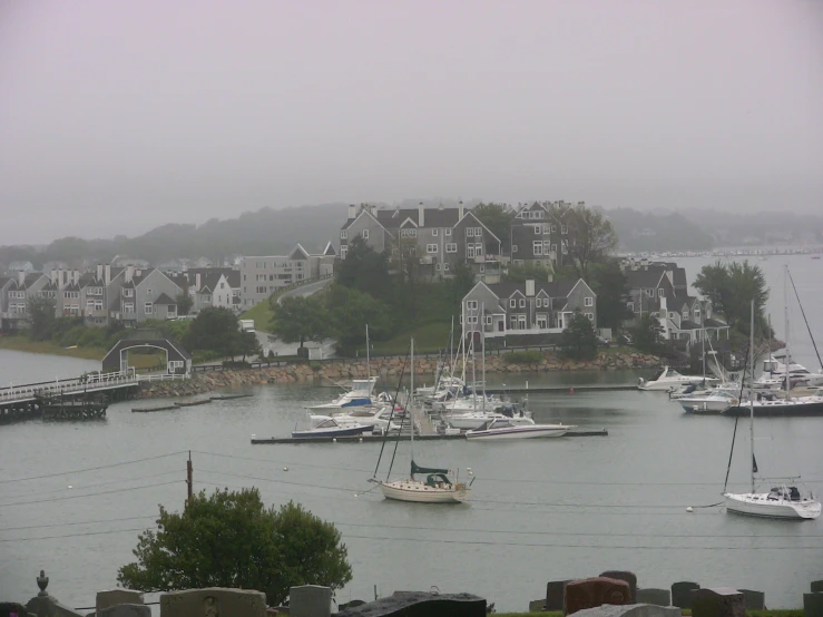 a harbor filled with lots of sailboats on top of it