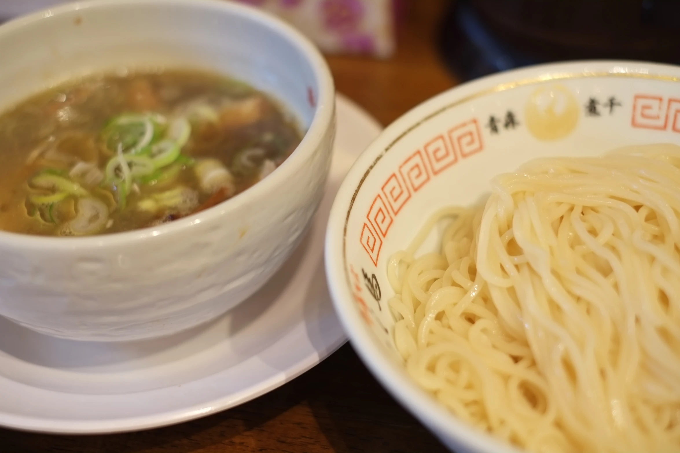 soup and vegetables in white bowl on table