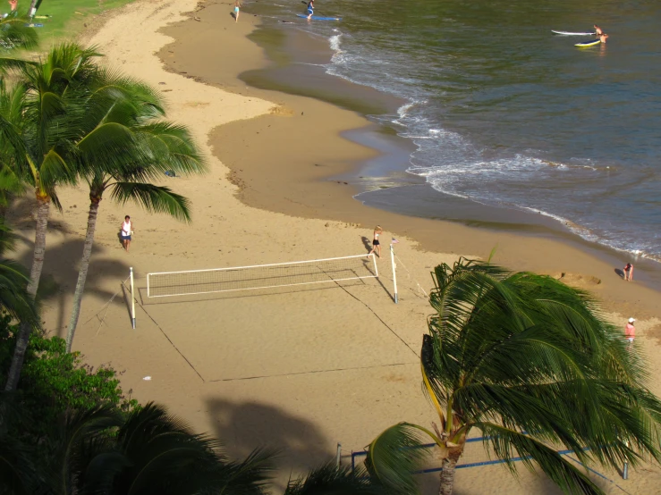 this is a volleyball court next to a beach