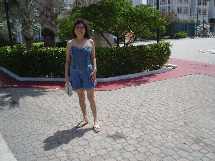 a lady that is standing in the street