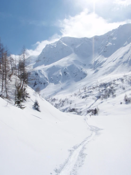 a man is on a snow ski slope