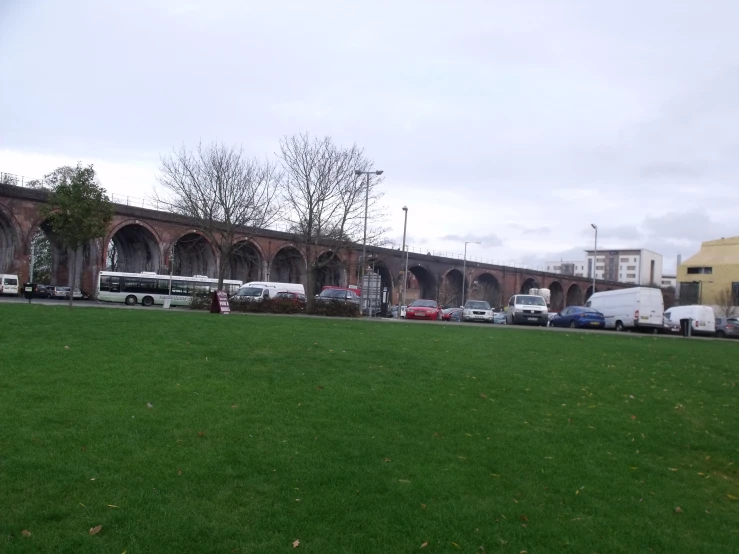 there are many cars parked near a building