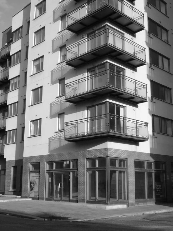 the facade of a large apartment building with balconies