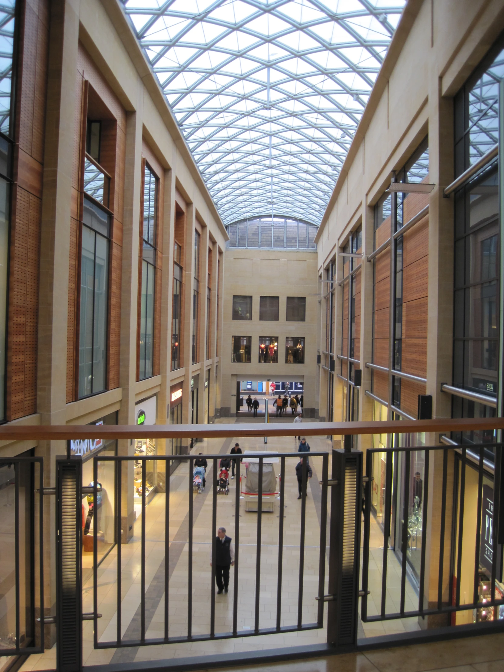 a view of an indoor mall filled with people