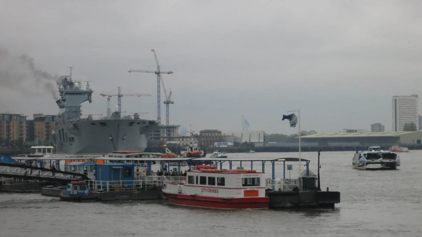 a large boat is docked near the dock