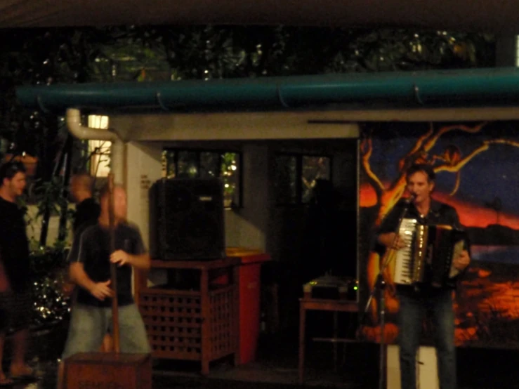 some people with accordions in front of a store