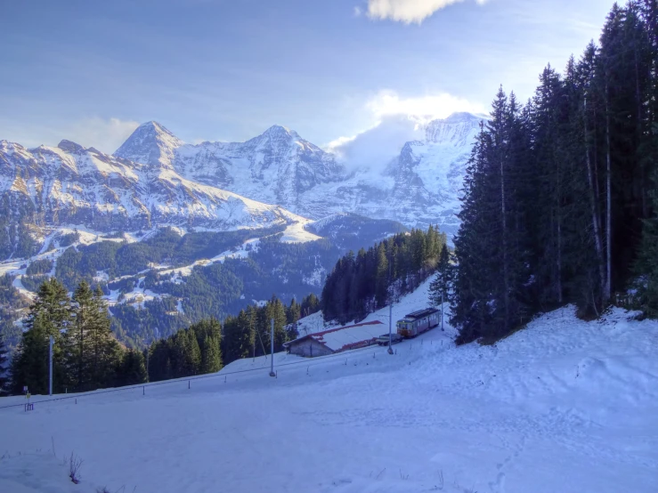 a view of the ski slope at a mountain resort