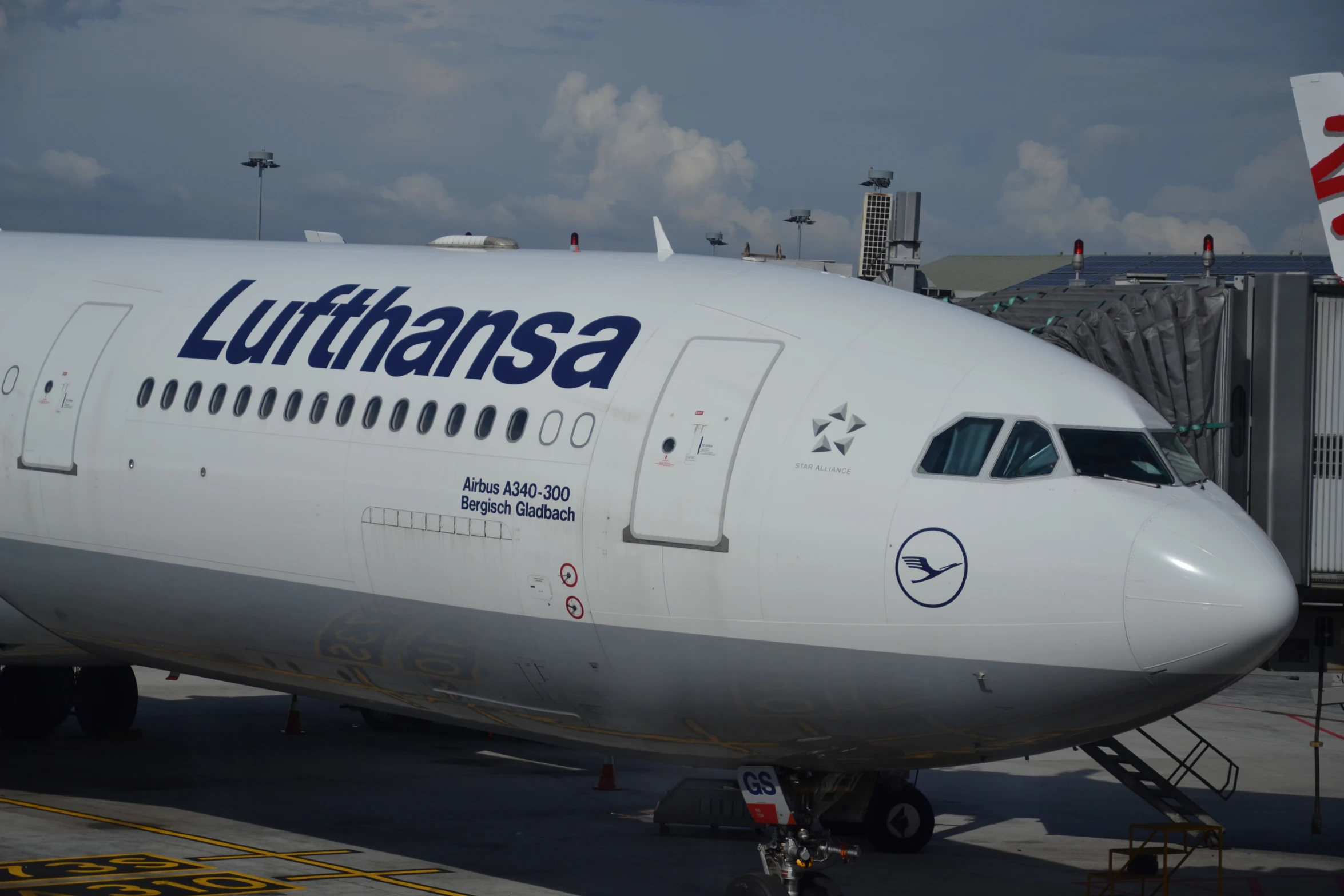 a large jetliner sitting on top of an airport tarmac