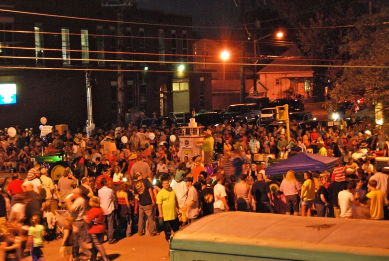 a large crowd of people at night time